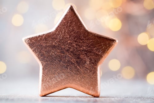Preview: Bronze Christmas Star Decoration. Holiday Decorations Bronze On Bokeh Background.