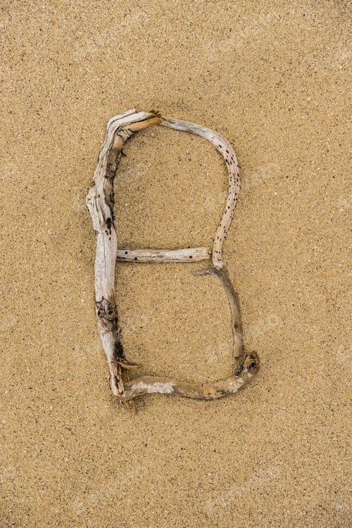Preview: Sand Beach Letters Alphabet, Letter B Written With Driftwood.