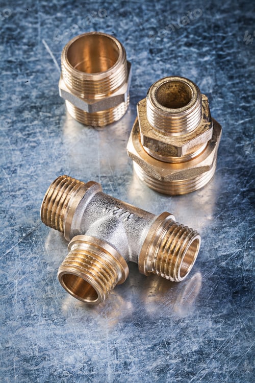 Preview: Brass Equal Tee Hose Nipples On Metallic Background Plumbing Concept.