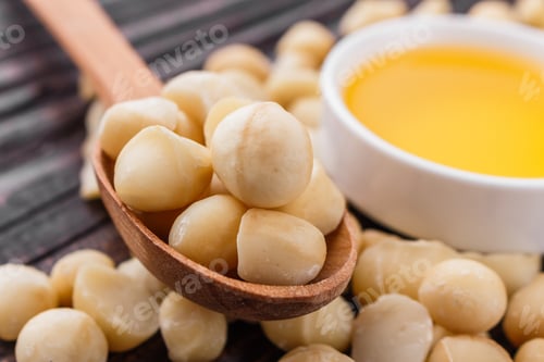 Preview: Delicious Macadamia Nuts On A Wooden Rustic Background