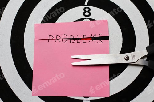 Preview: The Inscription On The Sticker: "Problems" Cut In Half Against The Background Of The Target For