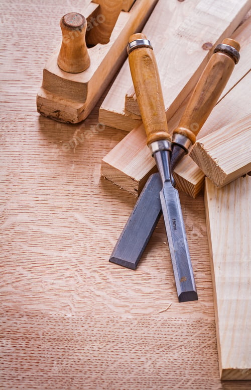 Preview: Carpentry Chisels Old Woodworkers Plane And Planks On Wooden Board