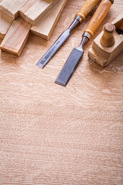 Preview: Chisels Woodworkers Plane And Wooden Planks On Board Construction Concept