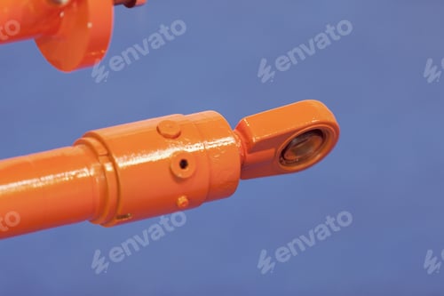 Preview: Detail Of Metal Processing Machines On The Blue Background, Note Shallow Depth Of Field