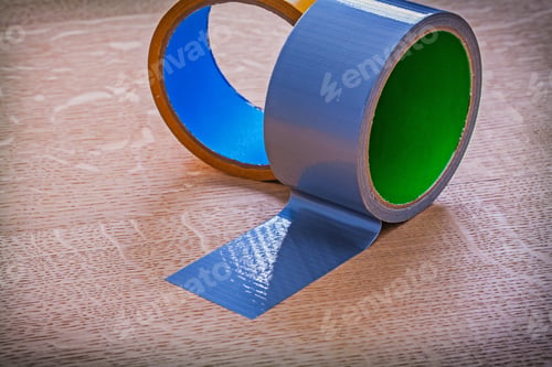 Preview: Close Up Of Duct Tapes On Vintage Brown Wooden Board Maintenance Concept