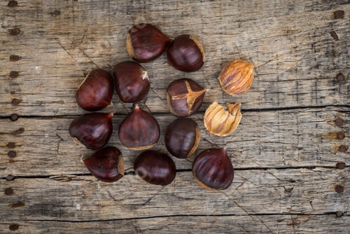 Preview: Fresh Raw Chestnuts On A Wooden Background