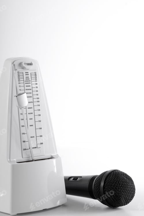 Preview: Metronome And Microphone On A White Background
