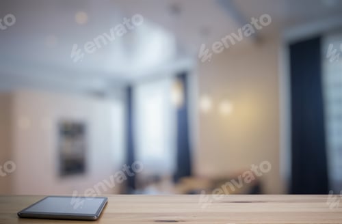 Preview: Tablet On Wooden Table In The Living Room