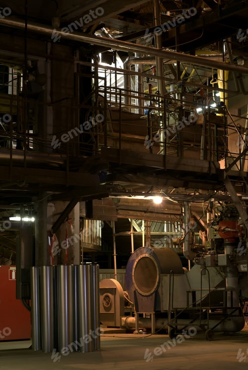 Preview: An Assortment Of Different Size And Shaped Pipes At A Power Plant