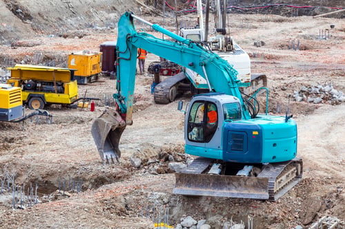 Preview: Construction Site With Machinery And Workers Building Foundations.