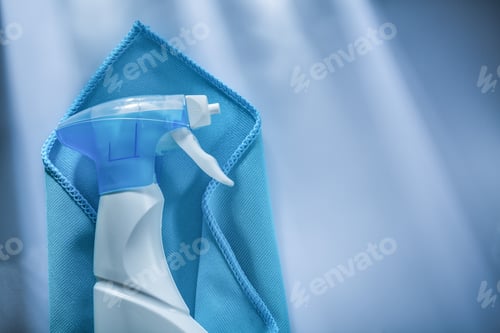 Preview: Blue Washing Rag Sprayer On White Surface.