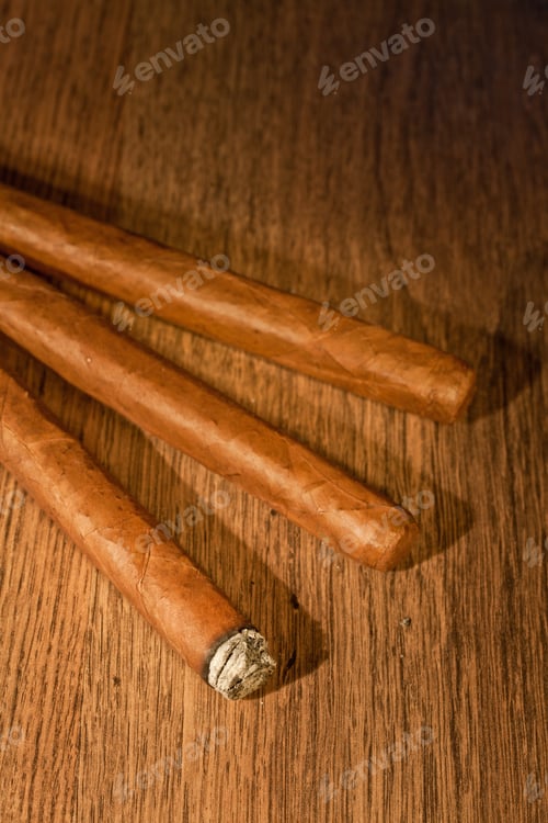 Preview: Typical Havana Cigars On Wooden Background