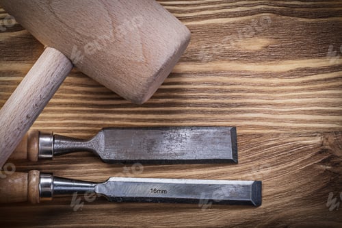 Preview: Lump Hammer Firmer Chisels On Vintage Wooden Board Construction Concept.