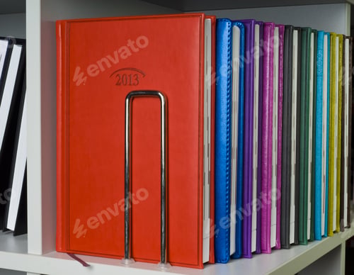 Preview: Close-Up Of A Few Colored Books (Notebooks, Diaries).
