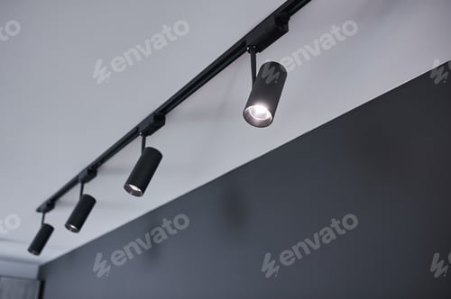Preview: A Group Of Hanging Black Metal Lights. No People.