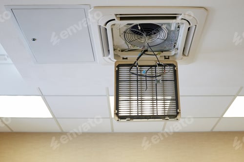 Preview: An Industrial Air Conditioner Hanging On A Ceiling Tank In The Room. Repair And Prevention Of