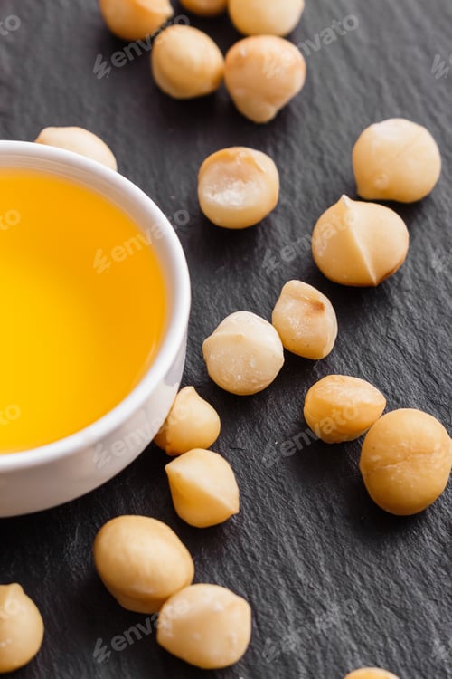 Preview: Delicious Macadamia Nuts On A Dark Stone Background