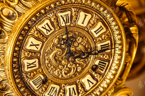Preview: Detail Of A Beautiful Vintage Clock In The Baroque Style In Brass.