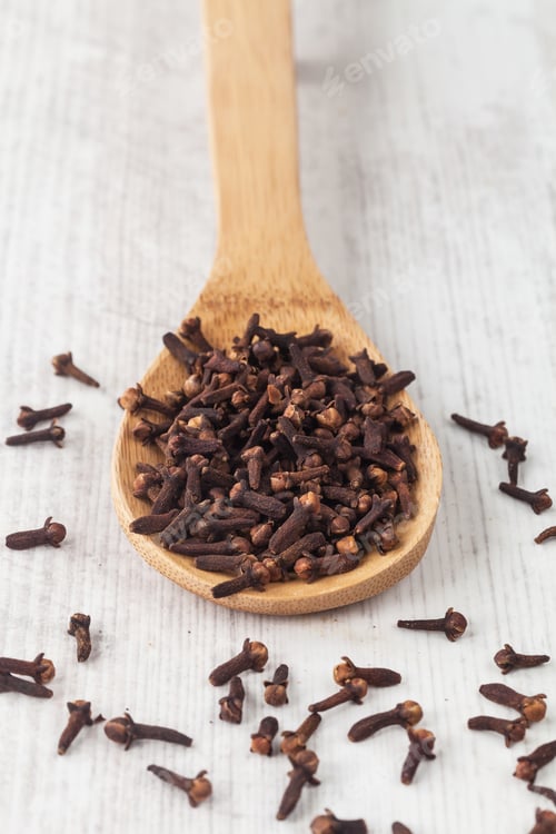 Preview: Bunch Of Dried Cloves Spice On A Wooden Background