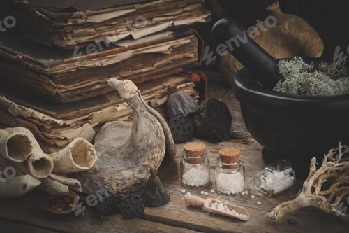 Preview: Bottles Of Homeopathic Globules, Mortar Of Dried Moss, Old Books, Dry Roots, Nuts And Plants