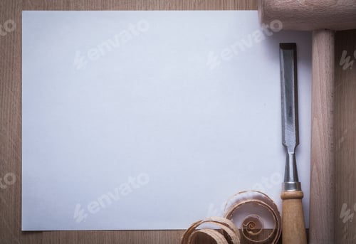 Preview: Curled Planning Chips Firmer Chisel Wooden Mallet And Blank Sheet Of Paper On Wood Board Copy Space