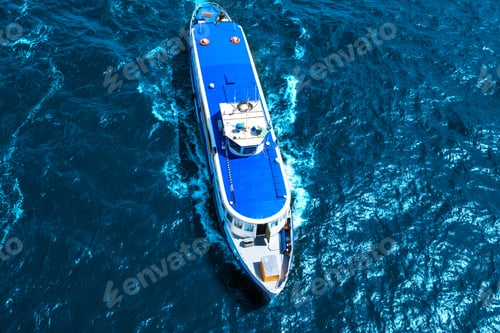 Preview: Top View Of A Cruise Boat In The Blue Sea