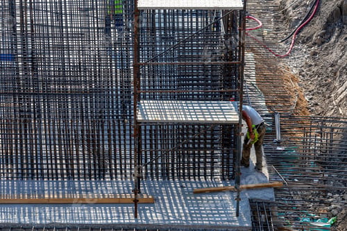 Preview: Steel Rebar Reinforcemen At Construction Site. Building Site With Rebar Foundation.