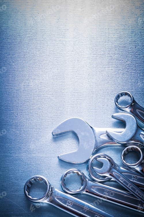 Preview: Collection Flat Spanners And Hook Wrenches On Metallic Background Construction Concept