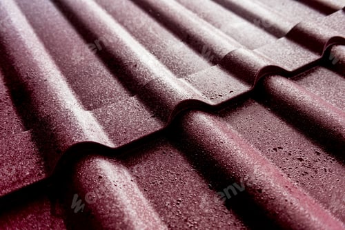 Preview: Red Metallic Roof Tiles Background With Drops Of Water.