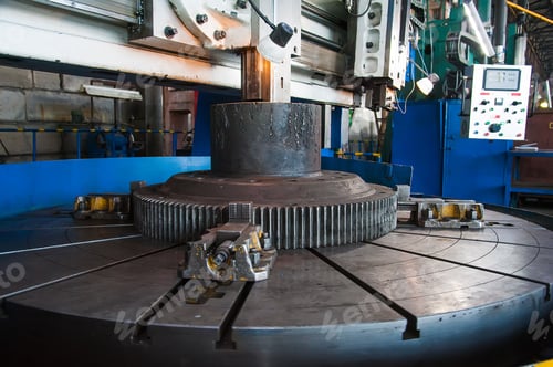 Preview: Worker Processes Metal On A Machine For Industrial Metalworking. Industry