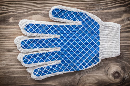 Preview: Safety Gloves On Wooden Board Construction Concept.