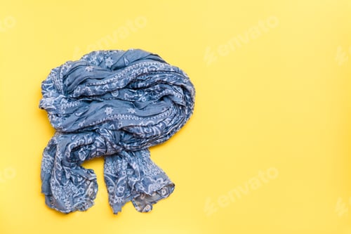 Preview: Beautifully Curved Cotton Neck Scarf On A Yellow Background. Spring Outfit