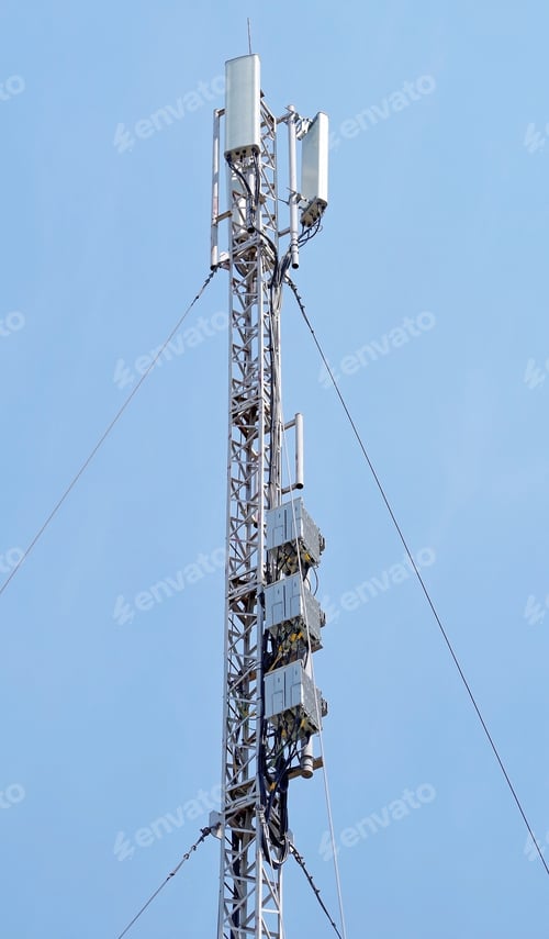 Preview: Tower With Aerials Of Cellular On A Background Blue Sky