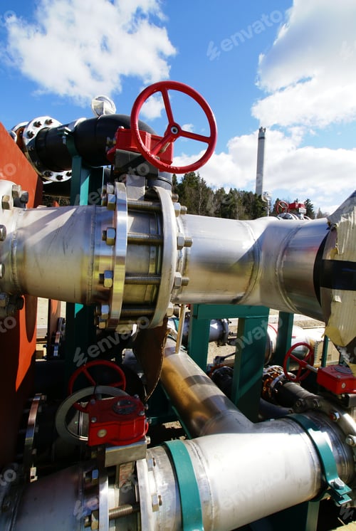 Preview: Industrial Pipelines On Pipe-Bridge Against Blue Sky