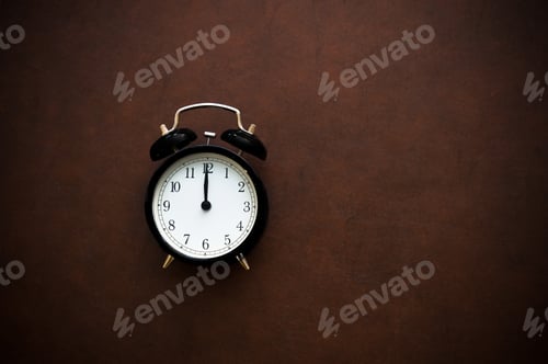 Preview: Vintage Alarm Clock Reminder Symbol On Noon Midnight Hour On Wooden Background