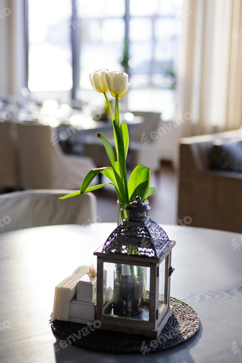 Preview: Bouquet Of Fresh White Tulips And Candlestick On The Table