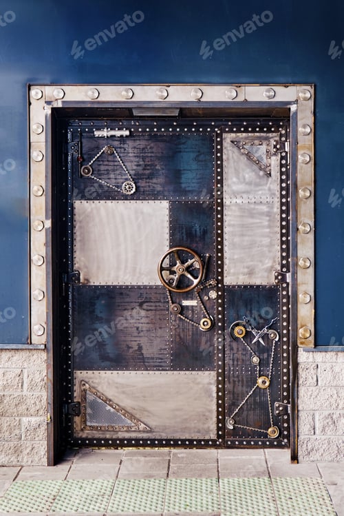 Preview: Metal Armored Door With A Mechanical Lock In The Style Of Steam Punk. Concept Of A Coronavirus