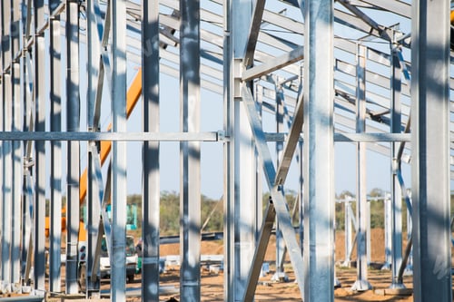 Preview: Steel Frame Workshop Is Under Construction Against A Blue Sky. New Technology Steel Frame For