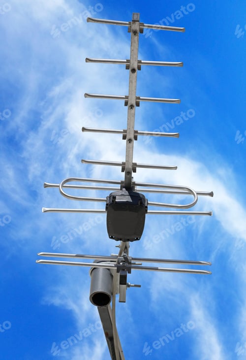Preview: Old Tv Antenna Against Blue Sky