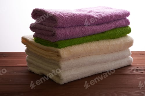 Preview: Many Stacked A Pile Of Towels On Wooden Table