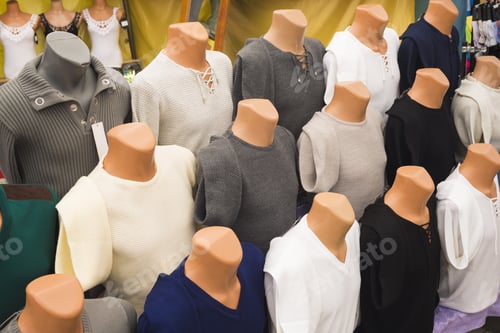 Preview: The Range Of Men'S Sweaters On Mannequins In The Market (Selective Focus)