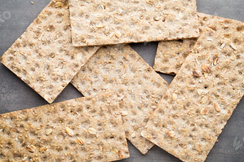 Preview: Stack Of Wholegrain Crispy Bread With Sunflower, Chia And Sesames Seeds