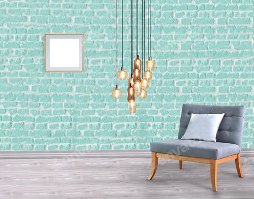 Preview: Cozy Armchair with Light Fixture on Brick Wall