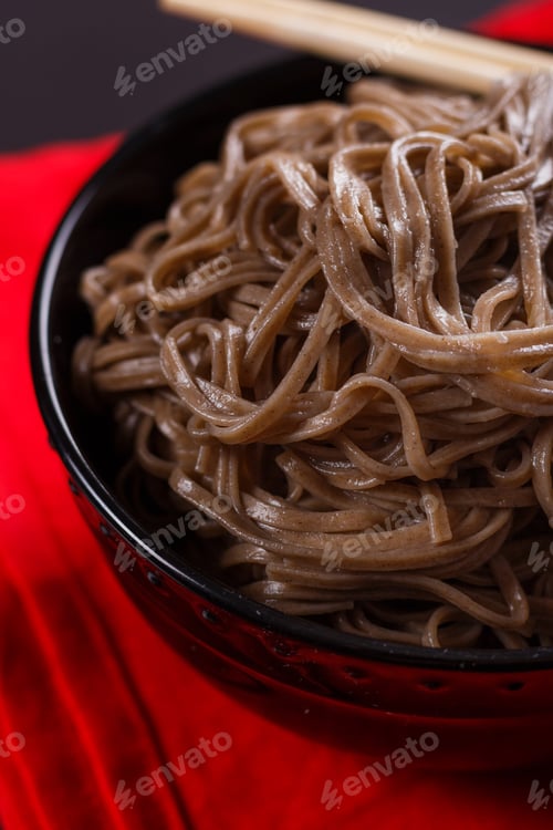 Preview: Buckwheat Noodle In A Black Bowl On A Dark Background