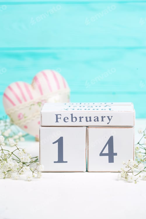 Preview: Calendar, White Flowers, Pink Decorative Heart On White Background Against Turquoise Wall