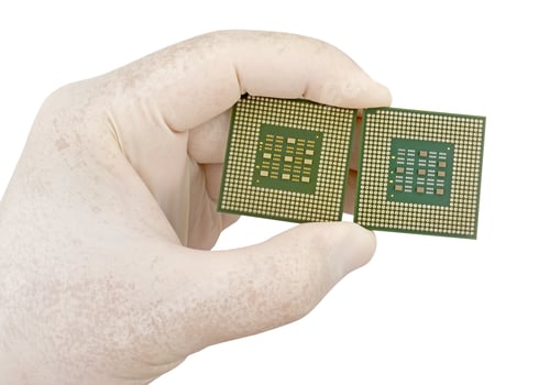 Preview: Hand In Glove And Computer Processor Chip (Cpu) Isolated On White Background