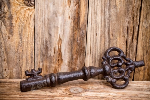 Preview: Old Vintage Key With Heart On Wooden Background.