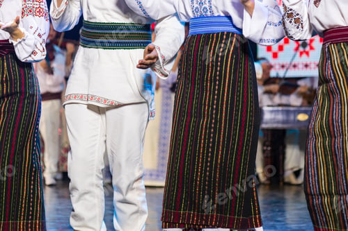 Preview: People In National Authentic Folk European Costumes Or Clothing. Selective Focus With Blurred