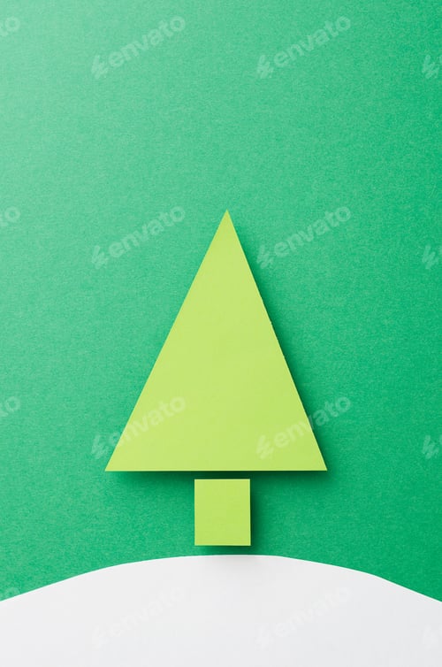 Preview: Paper Christmas Tree Cut From Green Paper Over Green Background, Top View