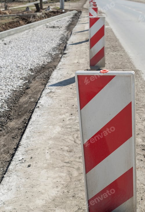 Preview: Red And White Plastic Road Fence On A Street